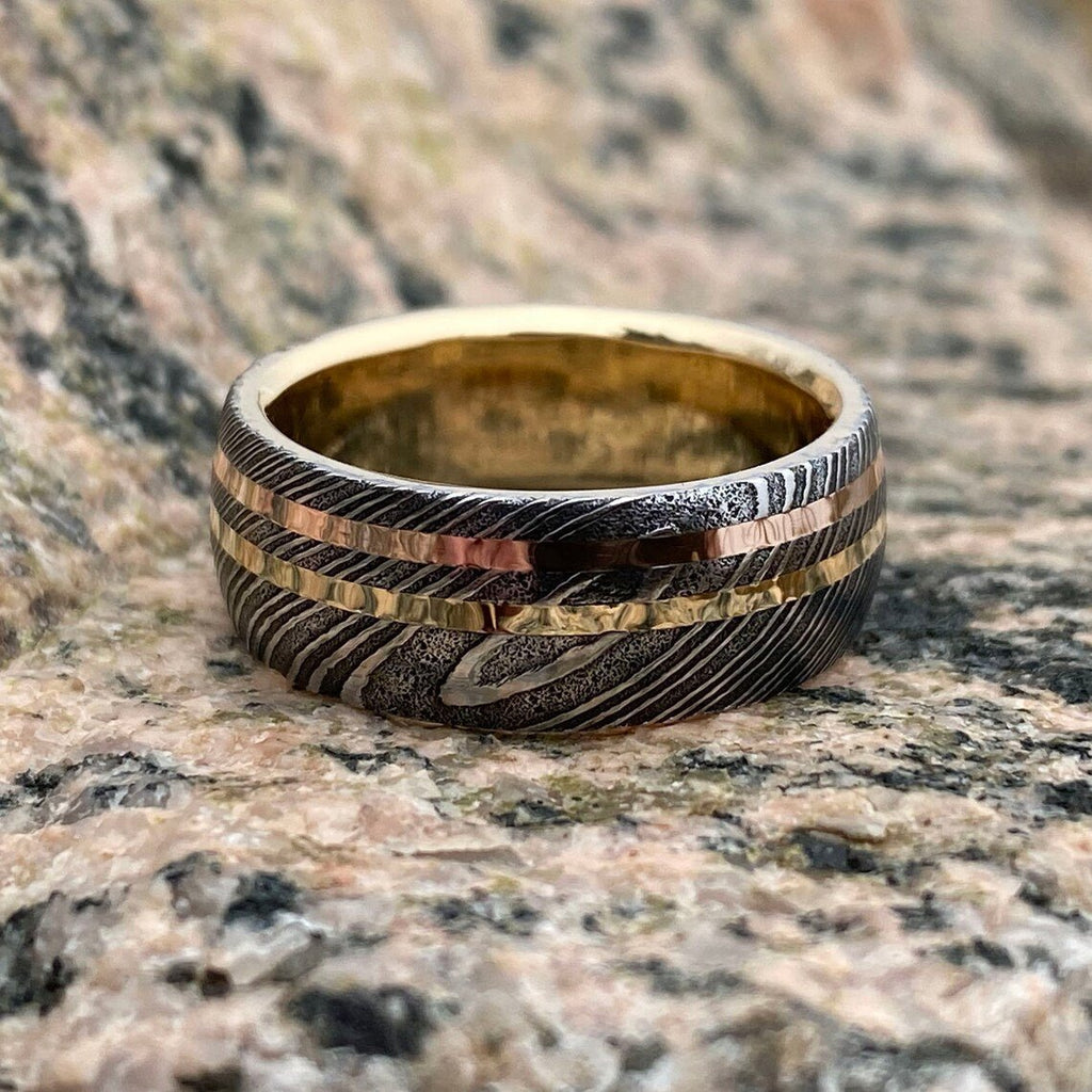 8mm Wide Damascus Steel Ring with Dual 14k Rose & Yellow Gold Off Center Grooves and a 14k Solid Gold Sleeve