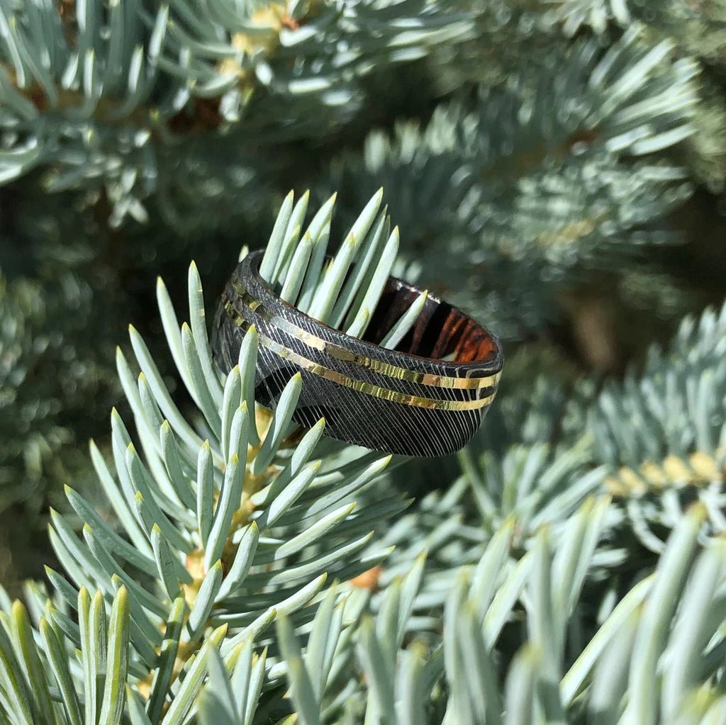 9mm Wide Damascus Steel Ring with Dual 14k Gold Off Center Grooves and a Arizona Ironwood Sleeve