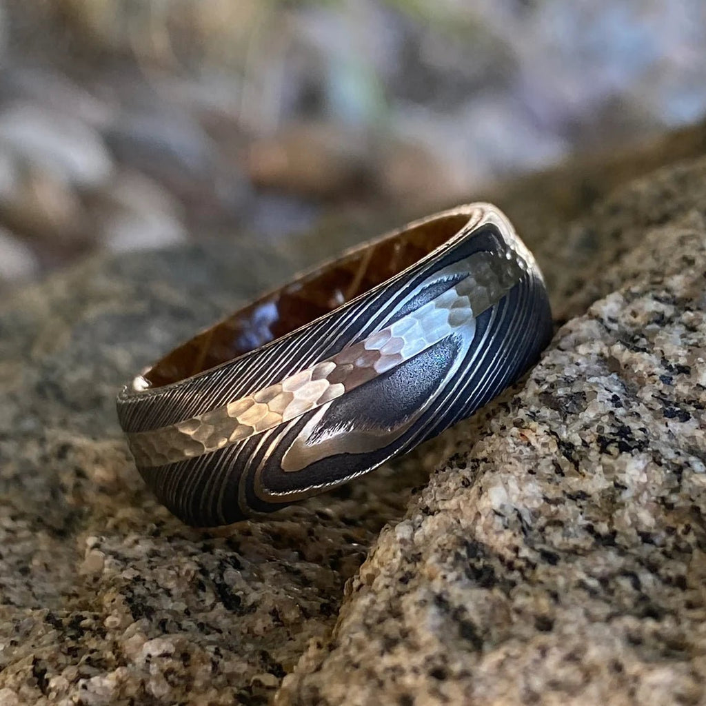 Damascus Steel Ring with 14K White Gold inlay and Whiskey Barrel Sleeve