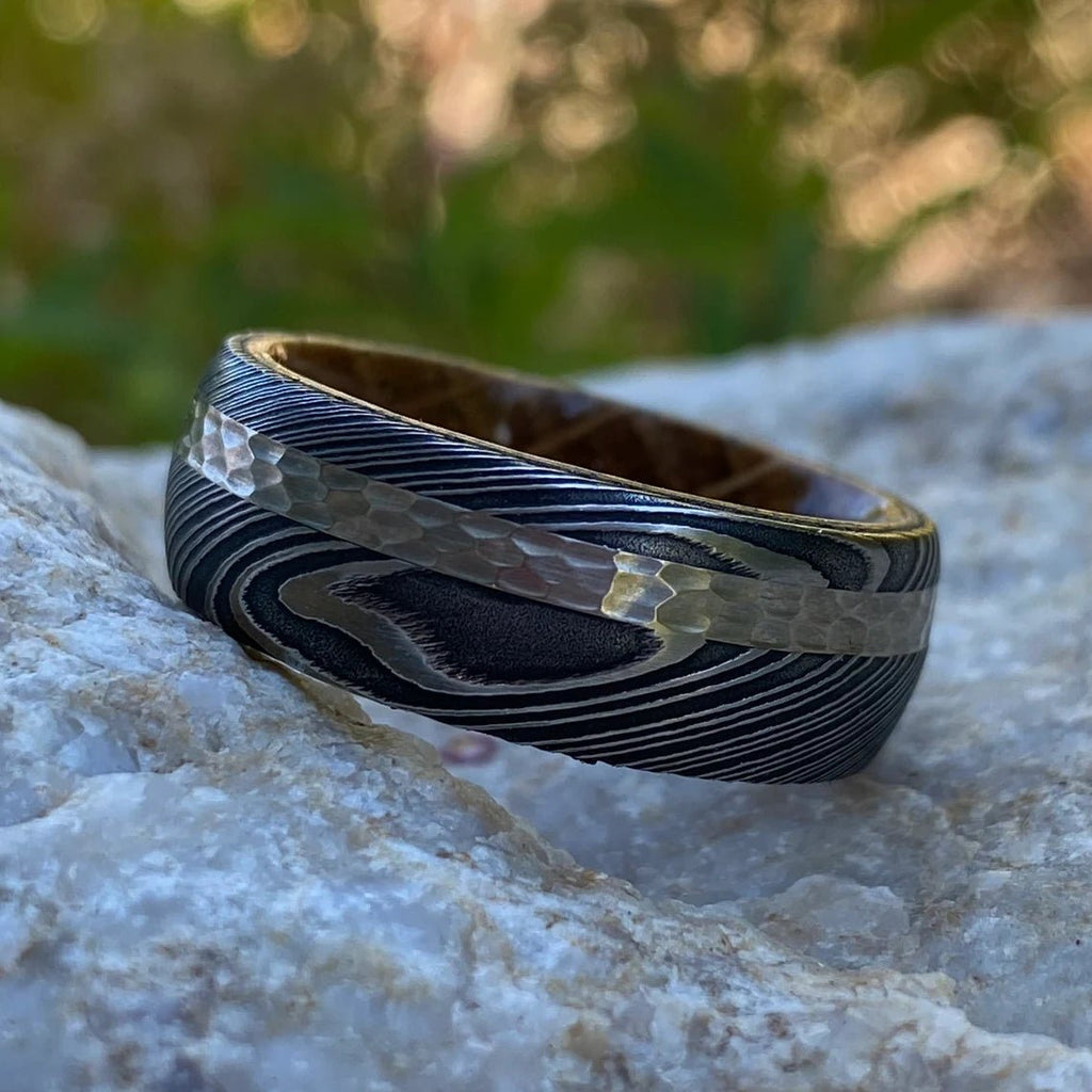 Damascus Steel Ring with 14K White Gold inlay and Whiskey Barrel Sleeve